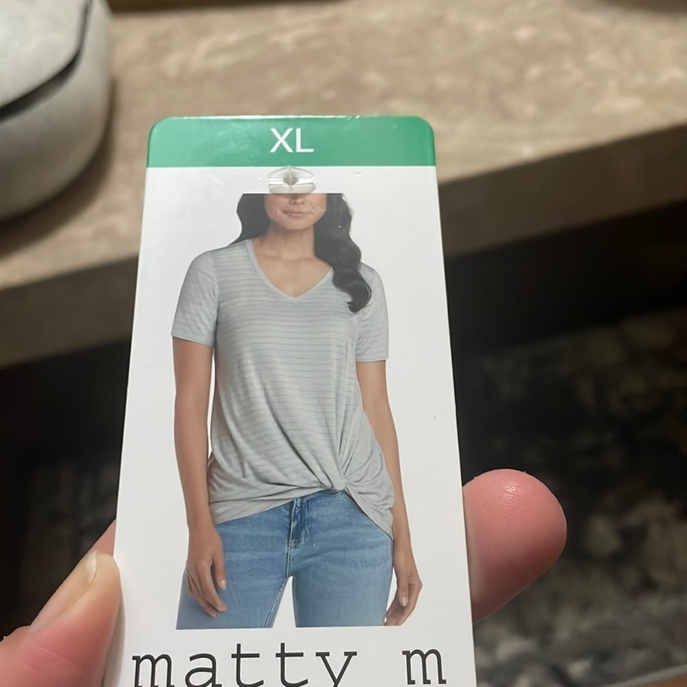 Woman’s Marty m  v\neck twist front tee